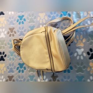 3/20$*gold mini backpack/handbag
